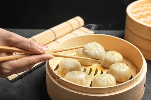 Woman Tasty Baozi Dumplings Bamboo Steamer Table — Stock Photo, Image