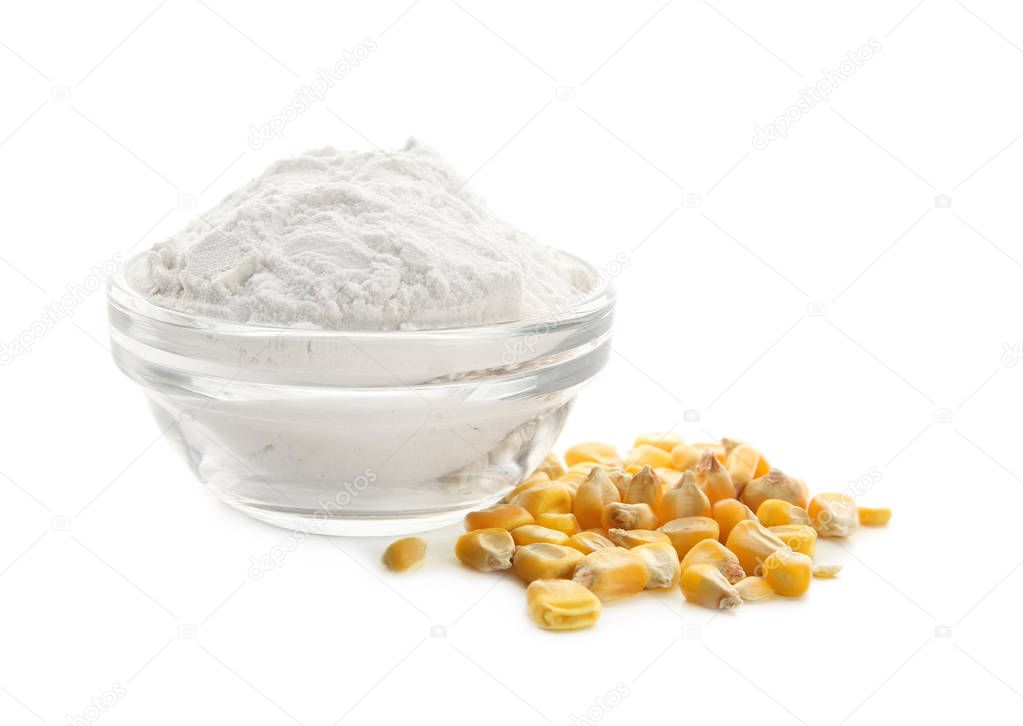 Bowl with corn starch and kernels on white background