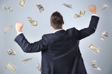 Para renk arka plan üzerinde uçan ile başarılı stok komisyoncu