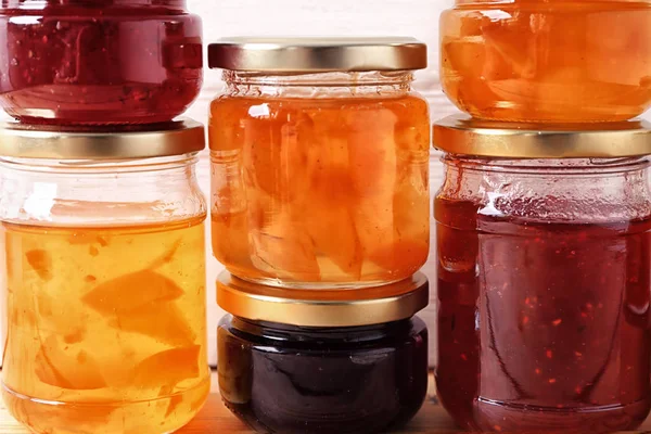 Jars with sweet jams, closeup — Stock Photo, Image