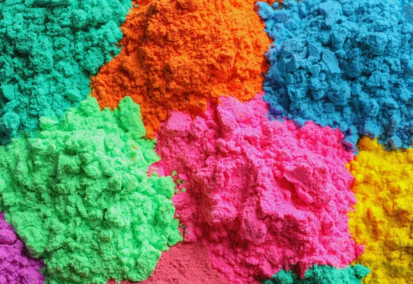 Polveri colorate per il festival Holi come sfondo — Foto Stock