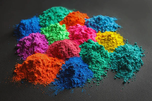 Colorful powders for Holi festival on dark background — Stock Photo, Image