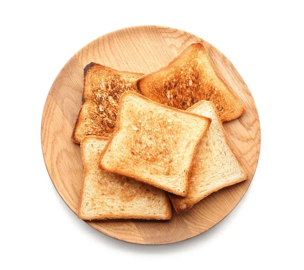 Placa de madeira com saboroso pão torrado no fundo branco — Fotografia de Stock