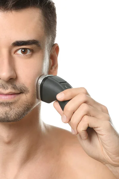 Young man shaving — Stock Photo, Image