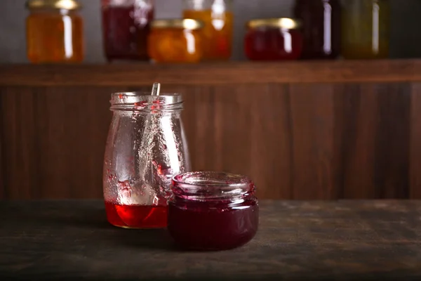 Jars with sweet jams — Stock Photo, Image