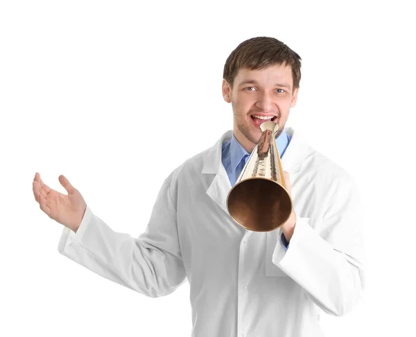 Male doctor with megaphone on white background — Stock Photo, Image