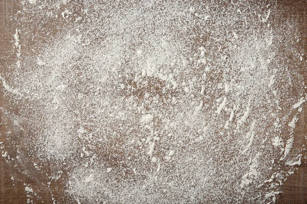 Scattered flour on wooden background Stock Image