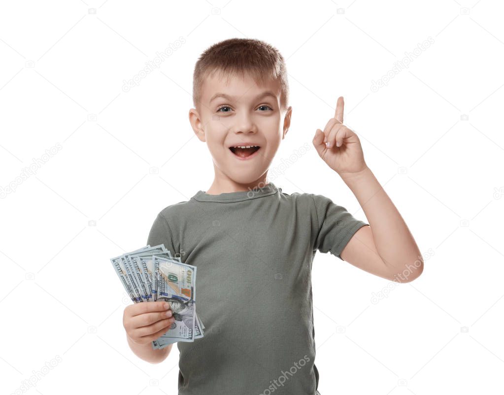 Little boy with raised index finger and money on white background