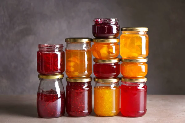 Jars with sweet jams — Stock Photo, Image
