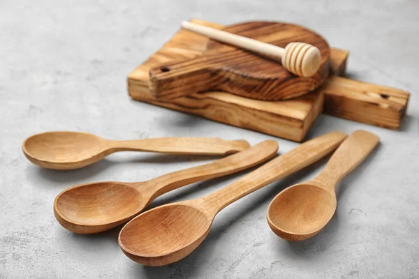 Wooden kitchen utensils on table — Stock Photo, Image