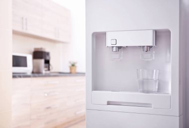 Modern water cooler in kitchen clipart