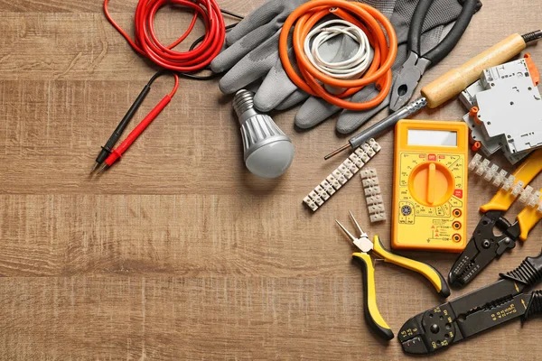 Different Electrical Tools Wooden Background — Stock Photo, Image