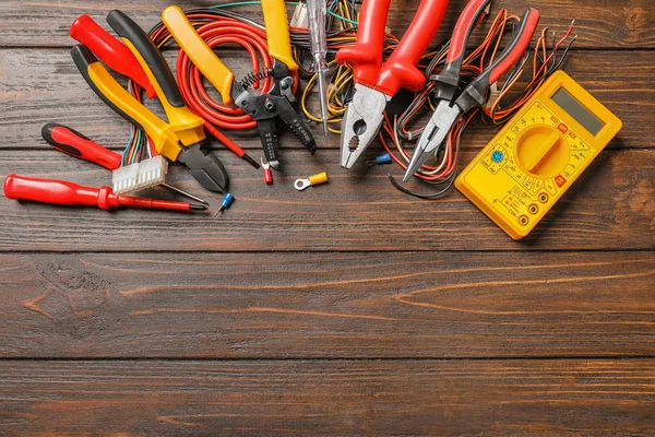 Different Electrical Tools Wooden Background — Stock Photo, Image