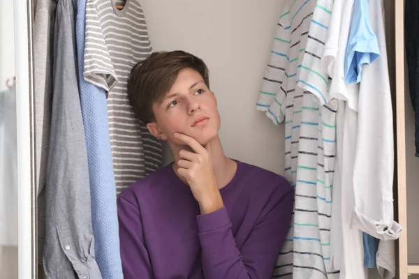 Thoughtful Teenager Clothes Wardrobe — Stock Photo, Image