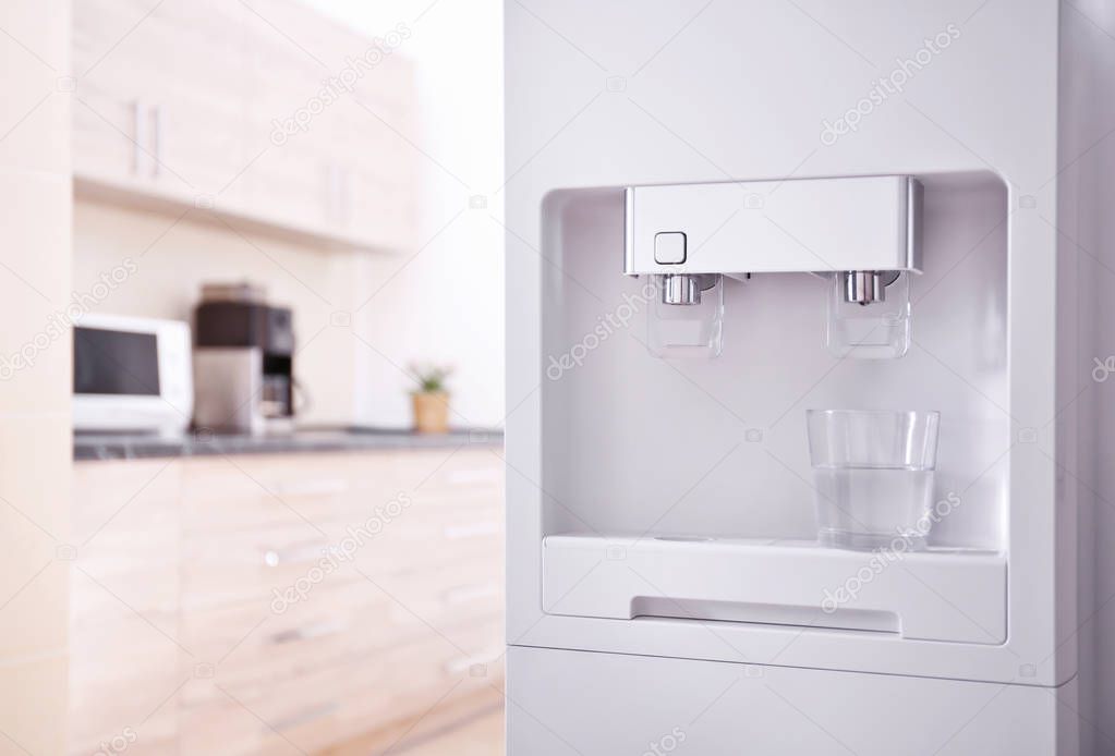 Modern water cooler in kitchen