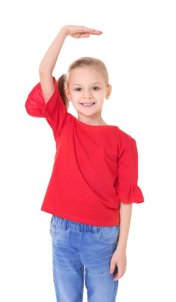 Niña midiendo altura sobre fondo blanco —  Fotos de Stock