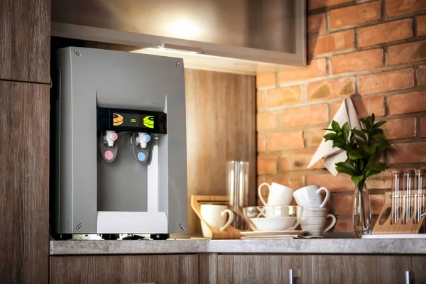 Modern water cooler on kitchen counter