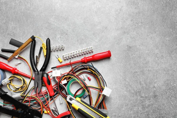 Different Electrical Tools Grey Background — Stock Photo, Image