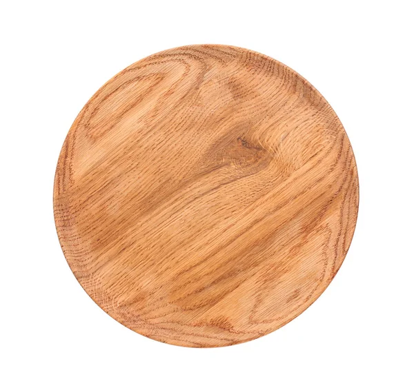 Деревянная тарелка на белом фоне. Кухонные принадлежности ручной работы — стоковое фото