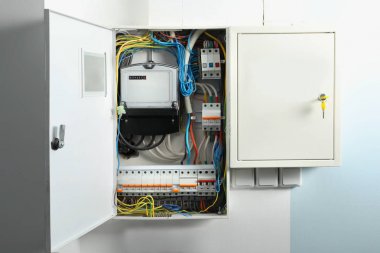 Distribution board on wall indoors clipart