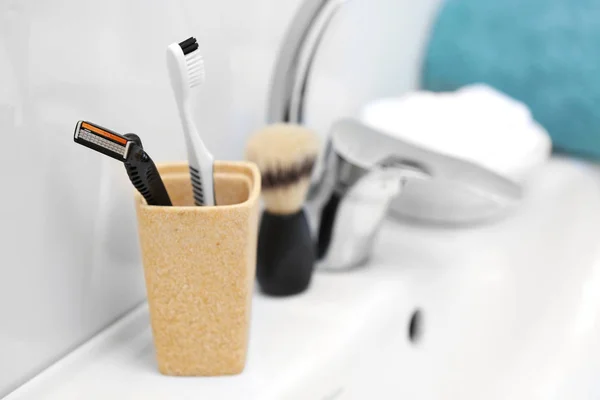 Shaving accessories for man on sink — Stock Photo, Image