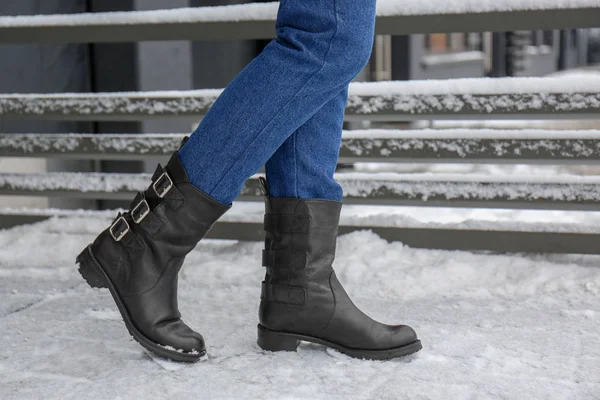 Stylish woman wearing warm shoes on city street in winter — Stock Photo, Image