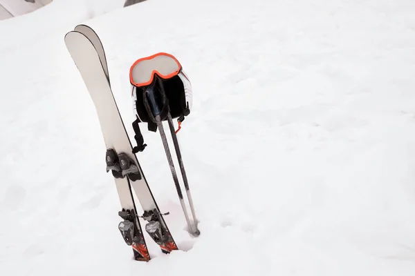 Ski equipment at snowy resort. Winter vacation — Stock Photo, Image