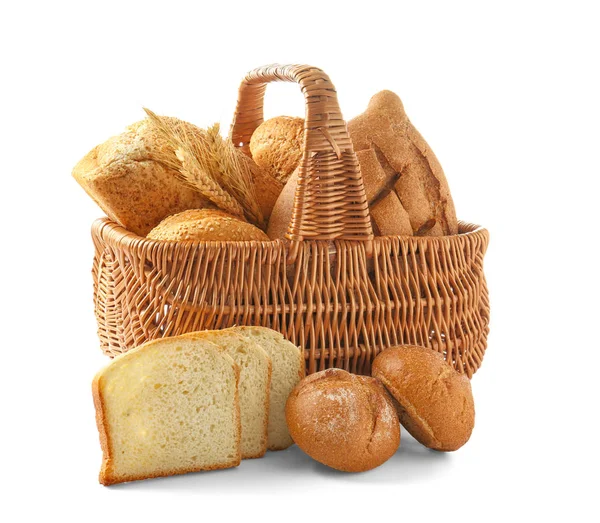 Basket with bread products on white background — Stock Photo, Image