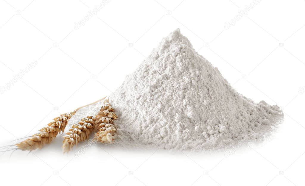 Heap of flour isolated on white background