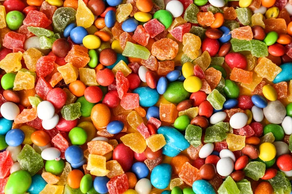 Arka plan olarak farklı renkli şekerler — Stok fotoğraf