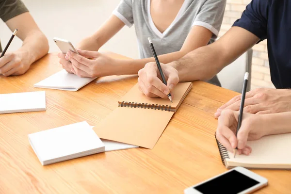 Group Young People Writing Notebooks Table Closeup Unity Concept — Stock Photo, Image