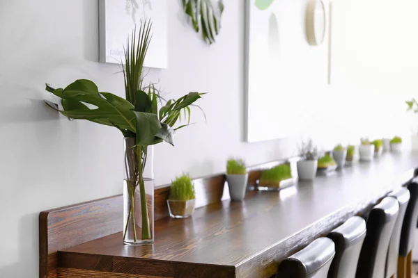 Modern cafe interior with wooden counter and chairs — Stock Photo, Image