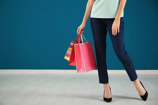 Young Woman Shopping Bags Color Wall — Stock Photo, Image