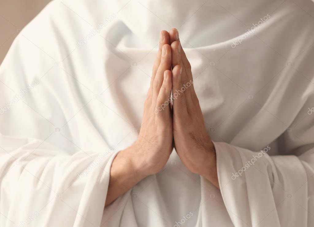 Young monk praying  