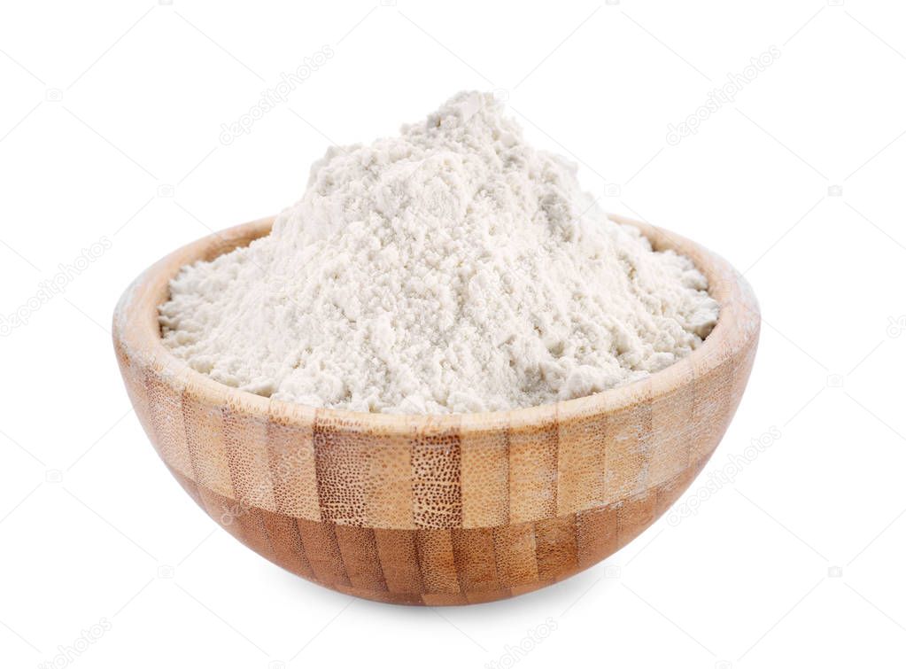 Wheat flour in wooden bowl  