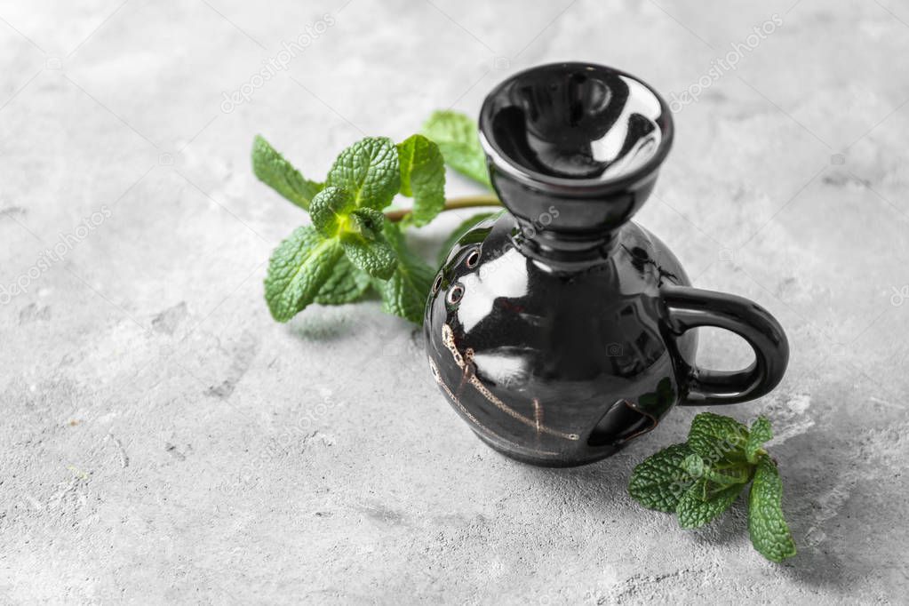 Aroma lamp with mint leaves 