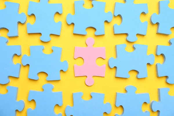 Puzzle pieces and one different — Stock Photo, Image