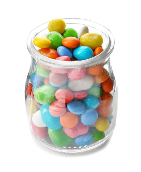Glass jar with colorful candies  