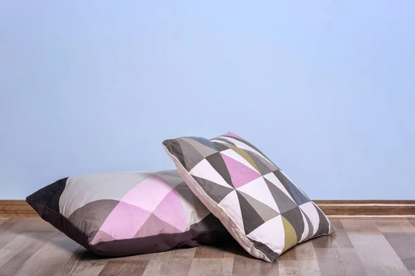 Soft pillows on floor — Stock Photo, Image