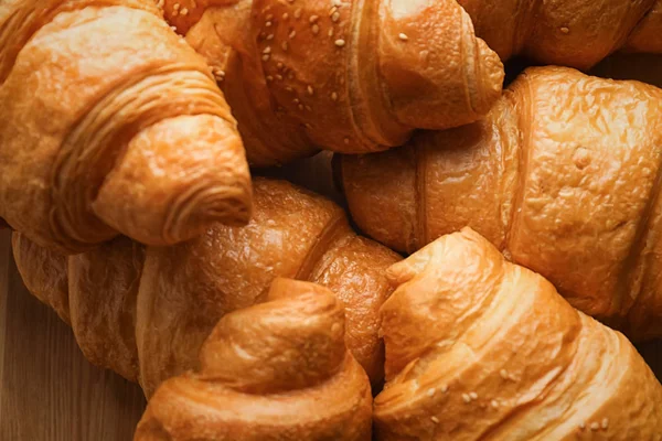 Tasty croissants on table — Stock Photo, Image