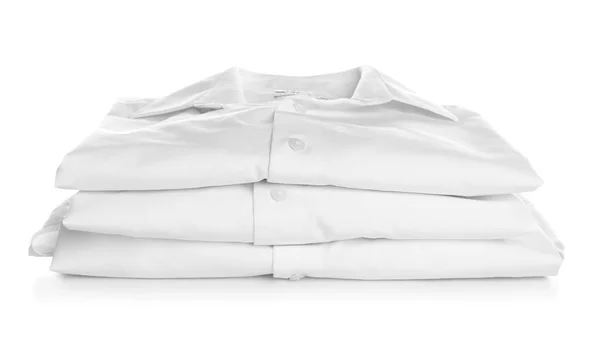 Pilha de camisas dobradas limpas — Fotografia de Stock