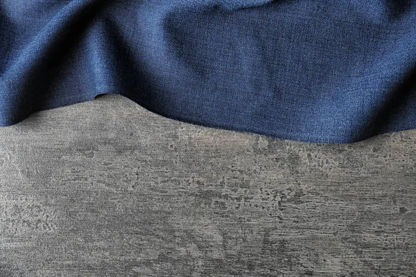 Textil oscuro sobre fondo gris. Textura de tela — Foto de Stock