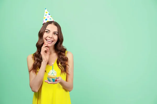 Happy Young Woman Party Hat Holding Birthday Cupcake Candle Green — Stok Foto