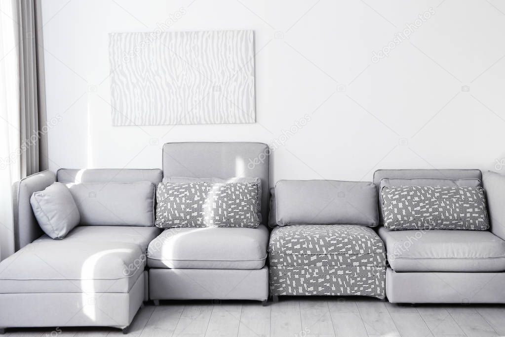 Comfortable sofa at light room 