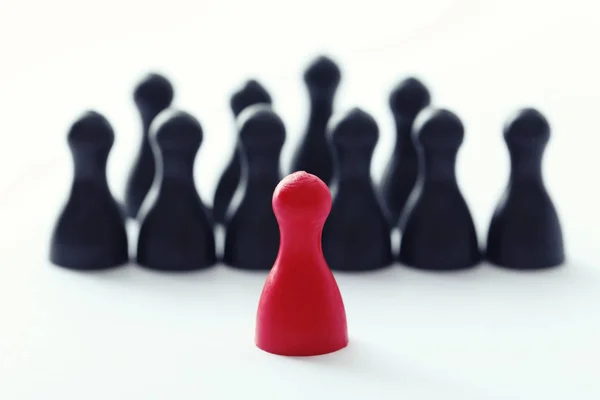 Red Pawn Front Black Ones White Background Difference Uniqueness Concept — Stock Photo, Image