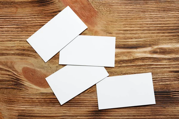 Blank business cards on wooden background — Stock Photo, Image