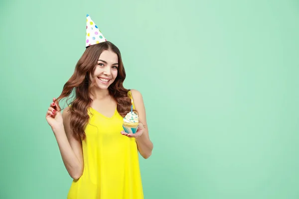 Happy Young Woman Party Hat Holding Birthday Cupcake Candle Green — Stock Photo, Image