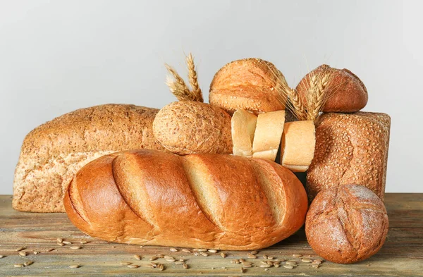 Freshly baked bread products on table — Stock Photo, Image