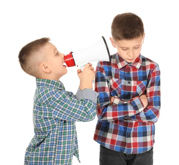 Little boy with megaphone shouting at another one, on white background — Stock Photo, Image