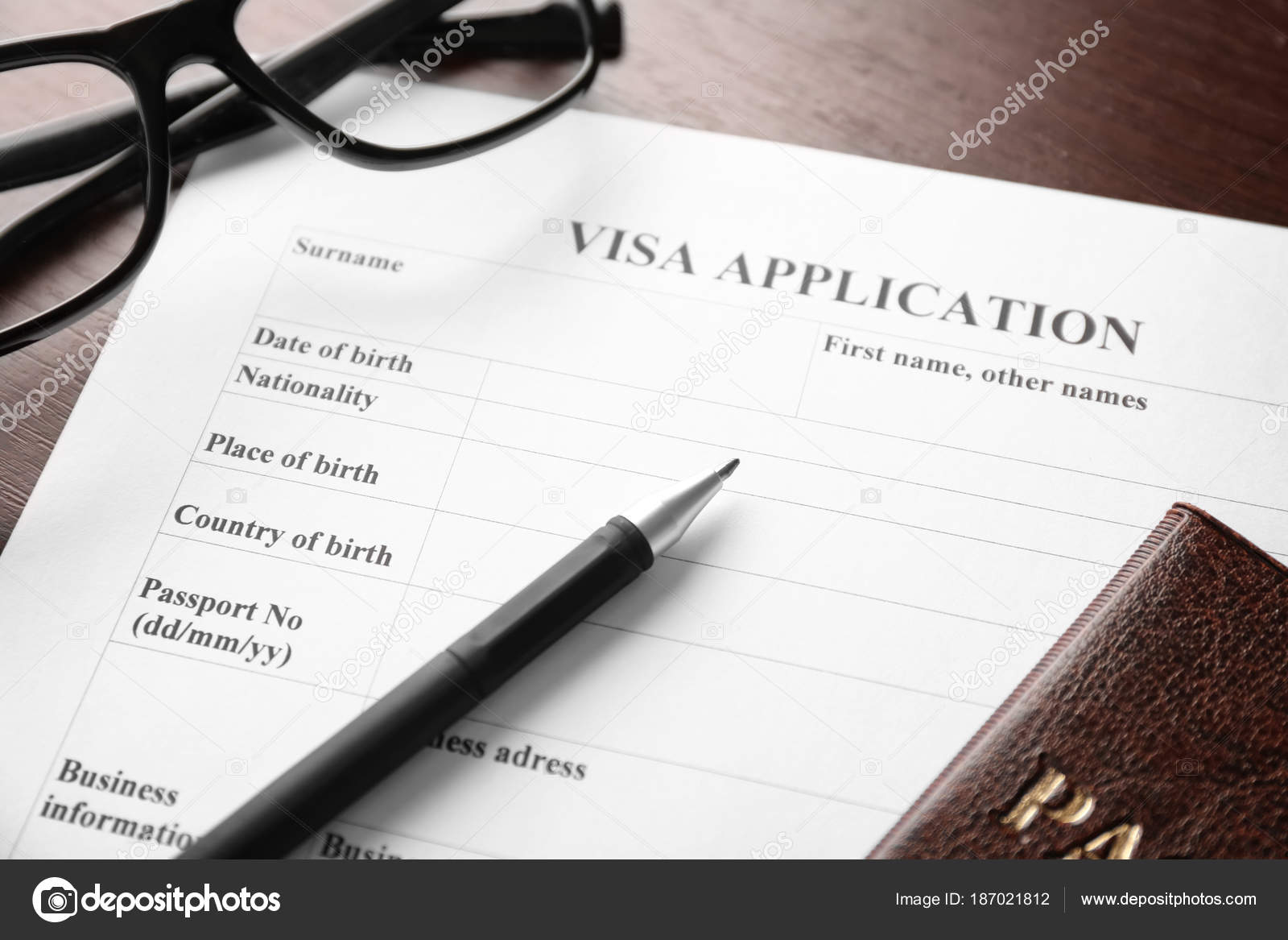 citizenship and ... form Visa Immigration application on table.